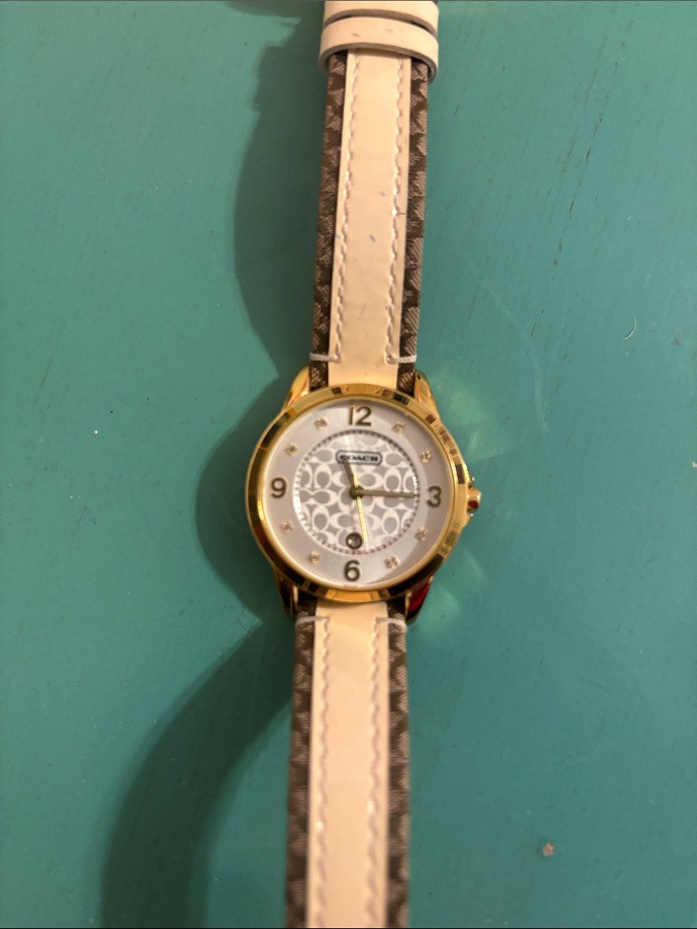 Coach Gold-Tone Watch with Cream and Tan Leather Strap